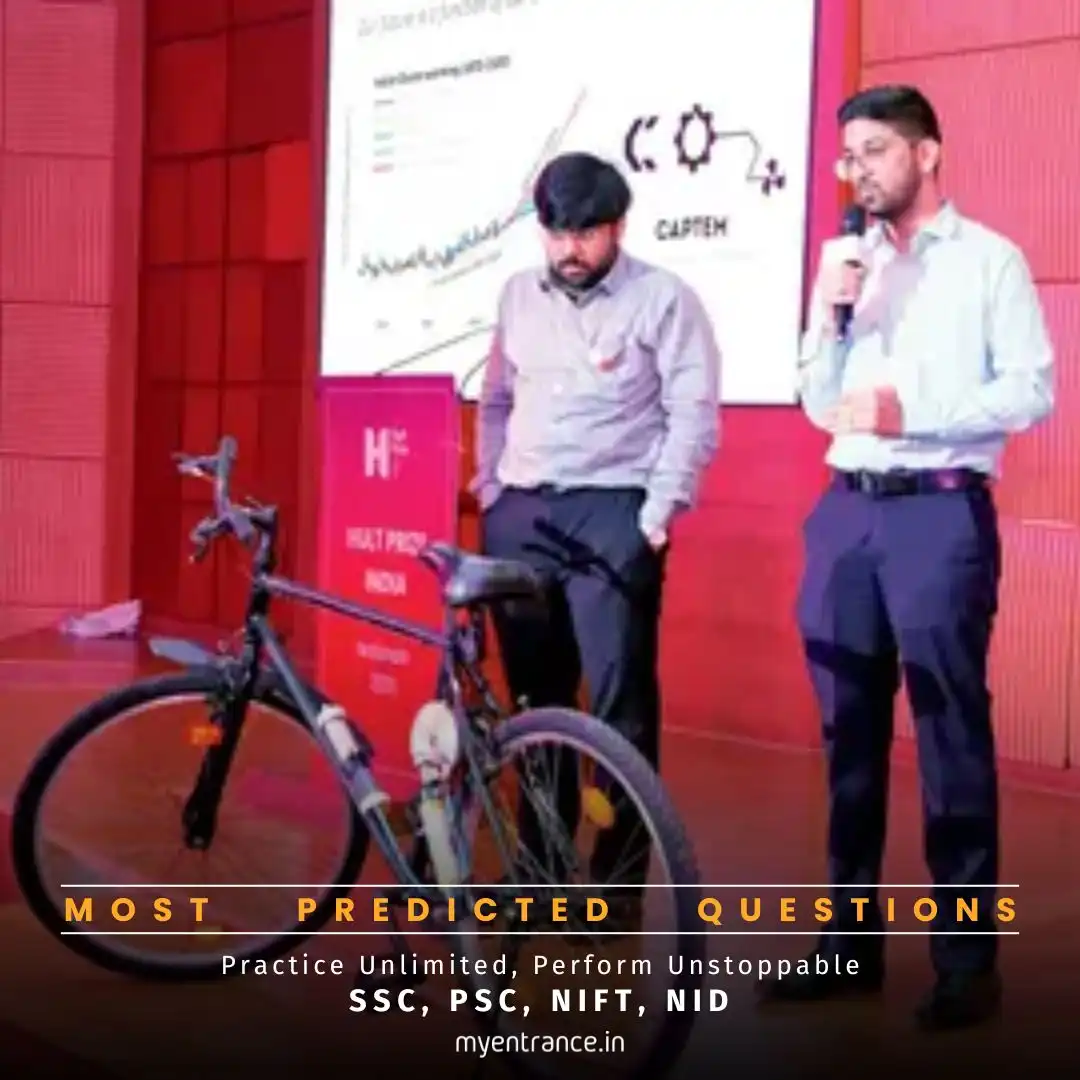 IIT-Bombay students demonstrate their carbon dioxide-absorbing bicycle innovation at an exhibition.