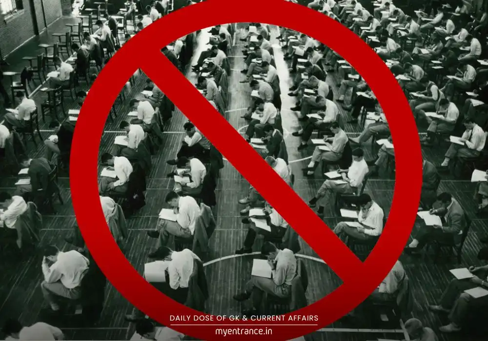 UPSC exam hall with a red prohibition sign symbolizing strict anti-cheating rules