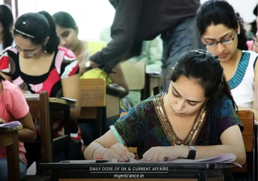 SSC exam candidate reviewing result document with laptop showing myentrance.in mock test platform
