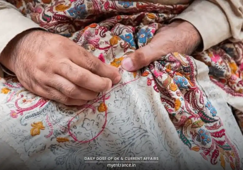 Kashmiri artisans working on traditional handicrafts under the Karkhandar Scheme